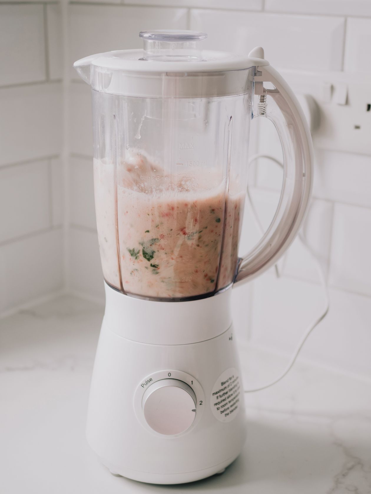 Best blender food processor combo — smoothie ingredients blending in a kitchen blender
