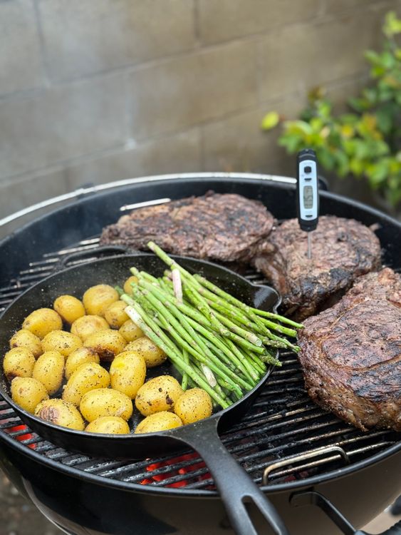 Ribeye steaks on a grill — knowing internal temperature is essential for perfect results