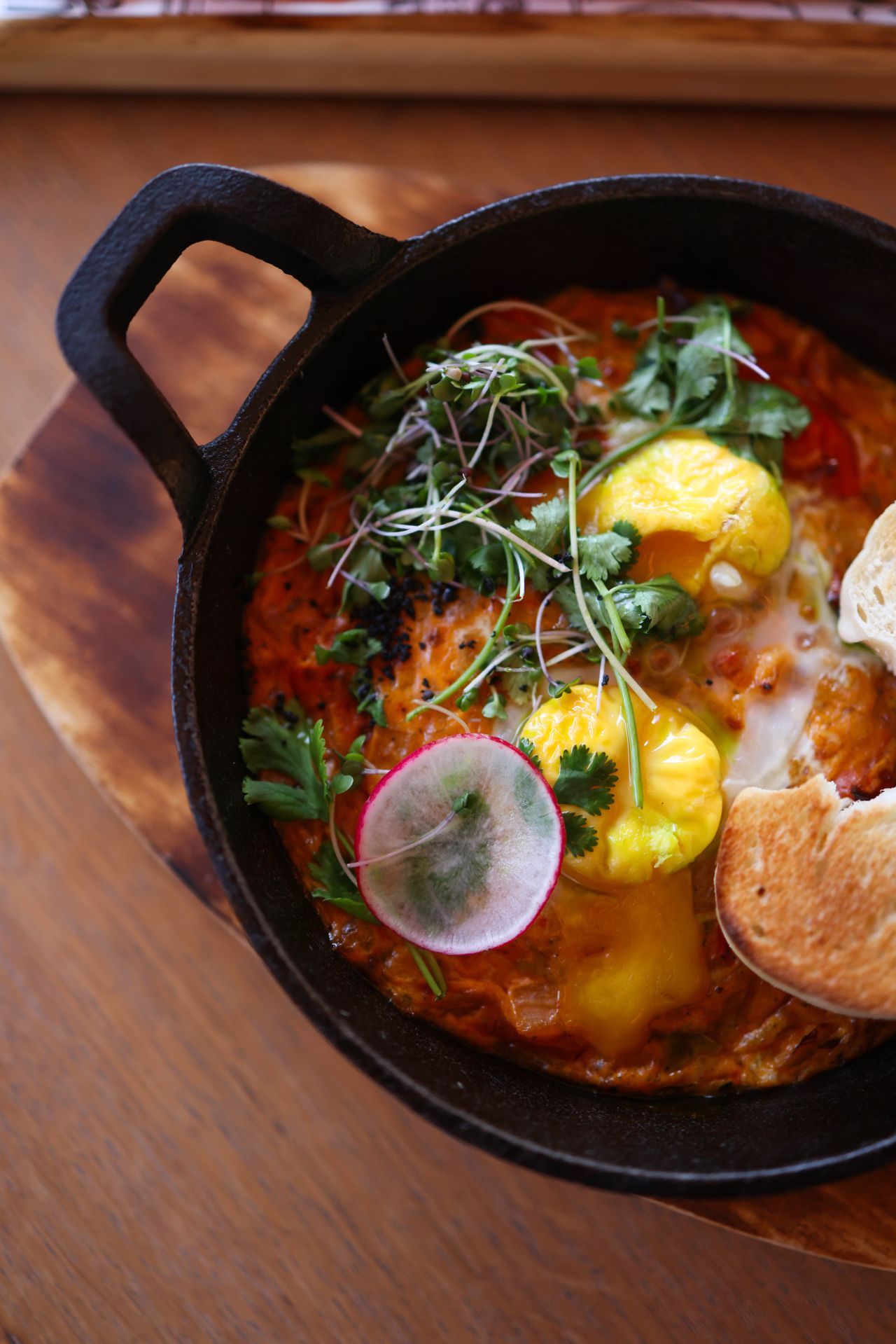 Shakshuka served in a cast iron skillet