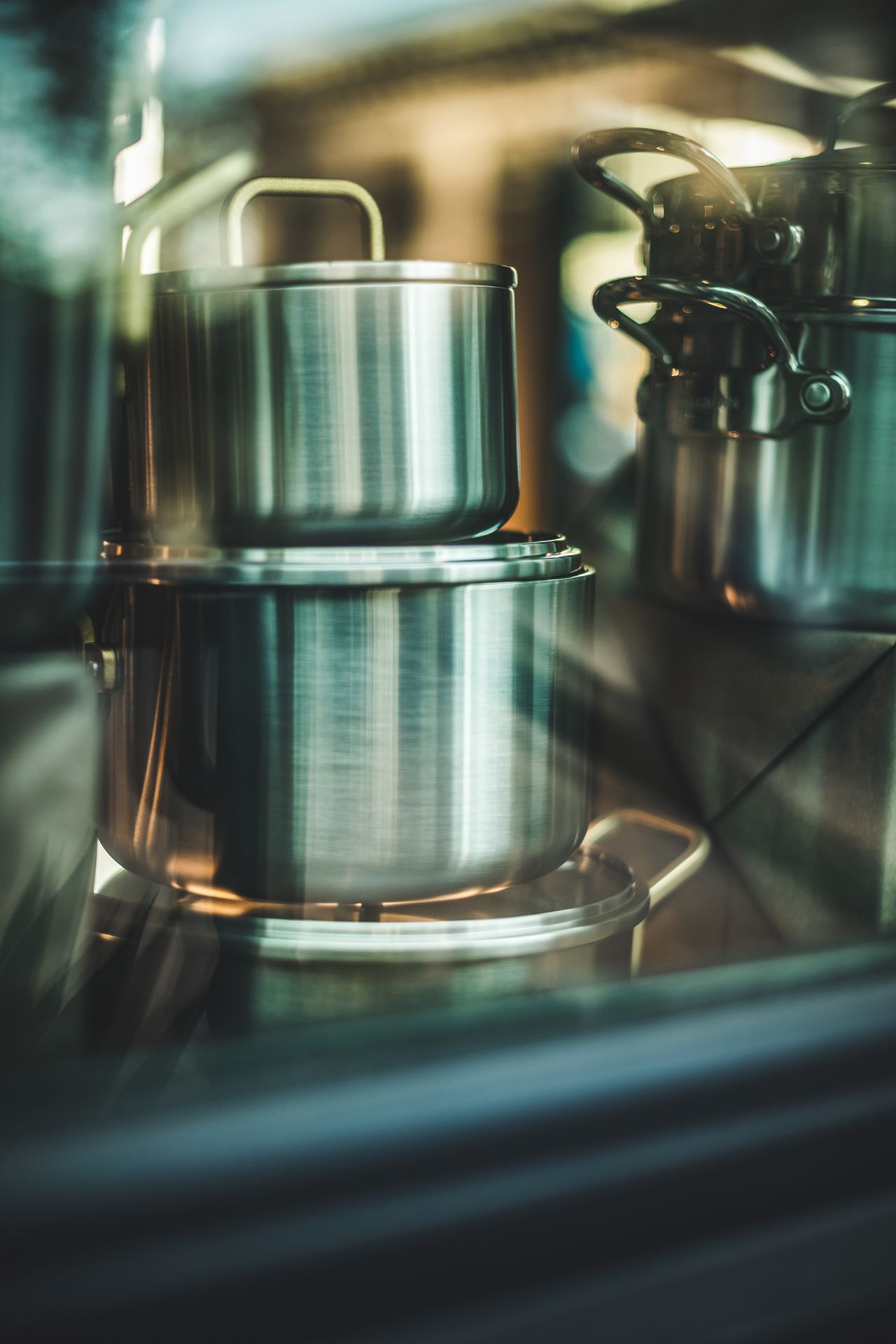 A stack of durable stainless steel cooking pots