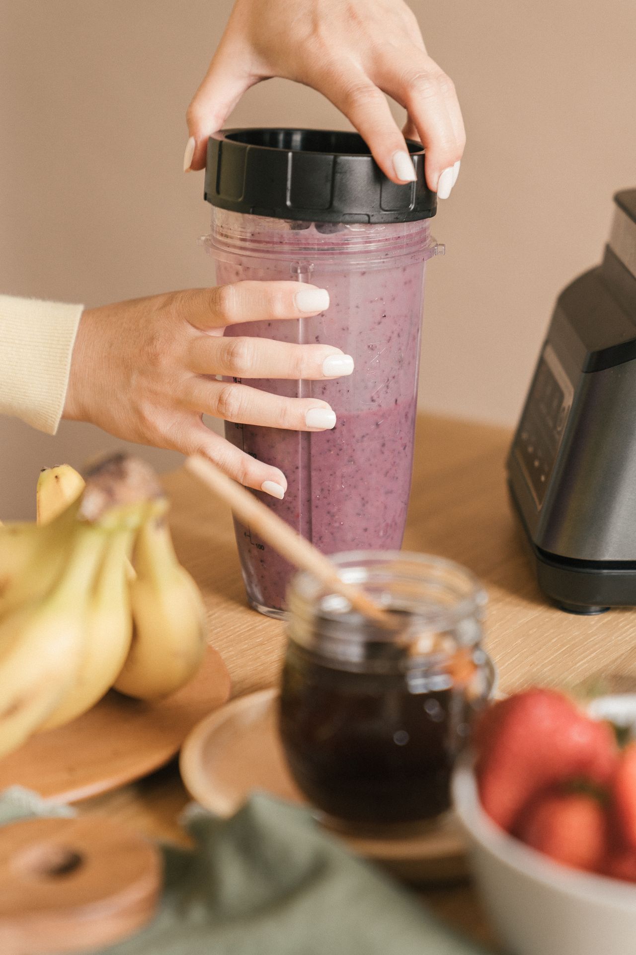 A personal blender cup, the same style used for grinding coffee beans