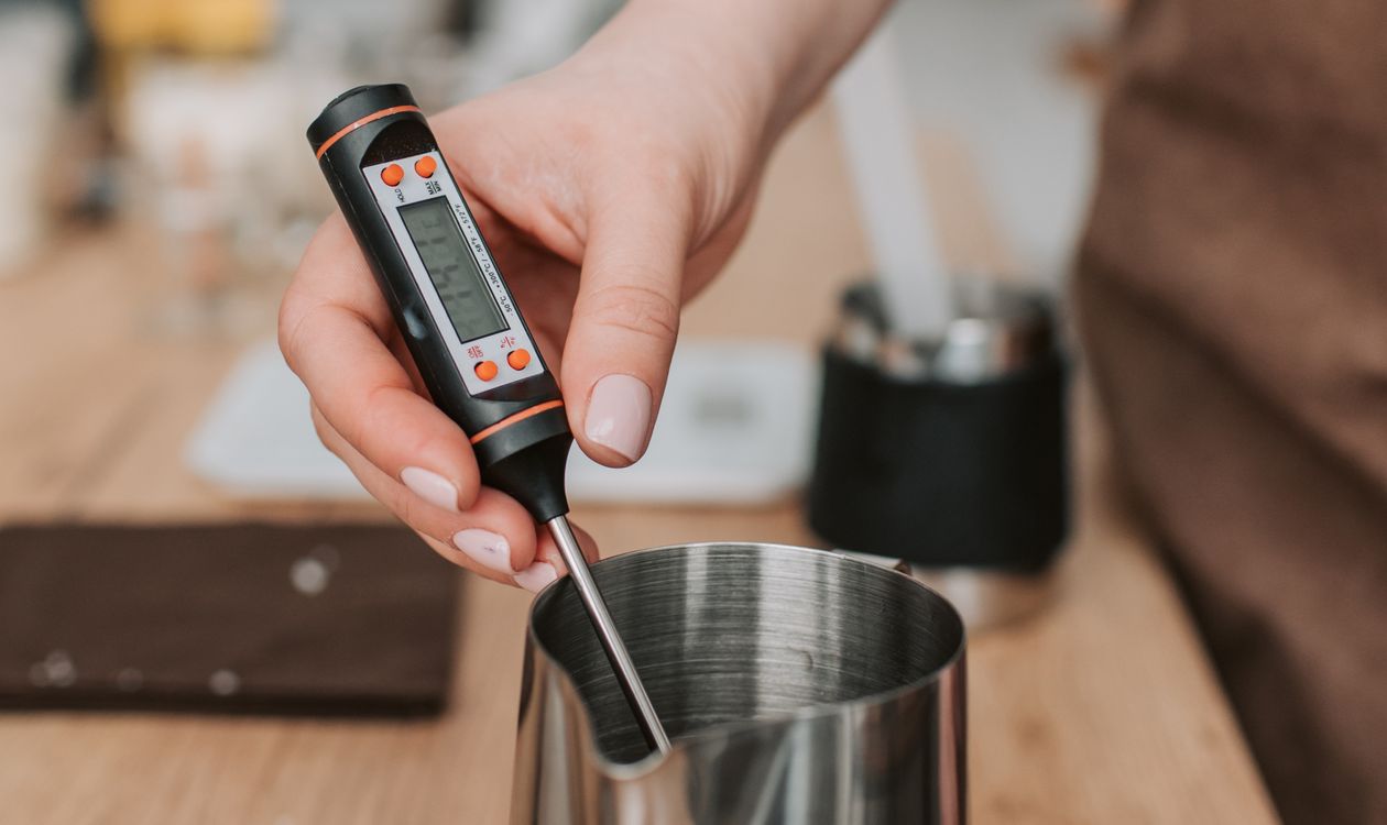 Using a digital probe thermometer while cooking