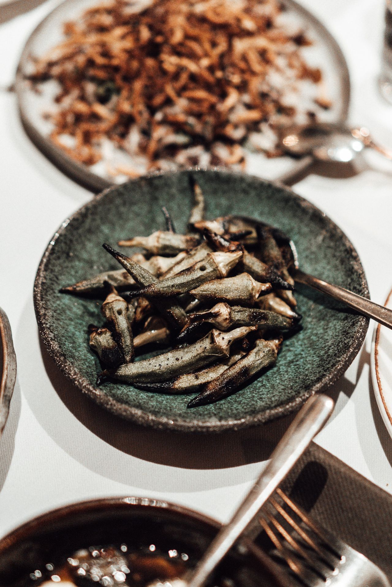 A plate of roasted okra pods