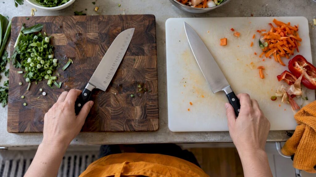 Knives on wood and plastic cutting boards